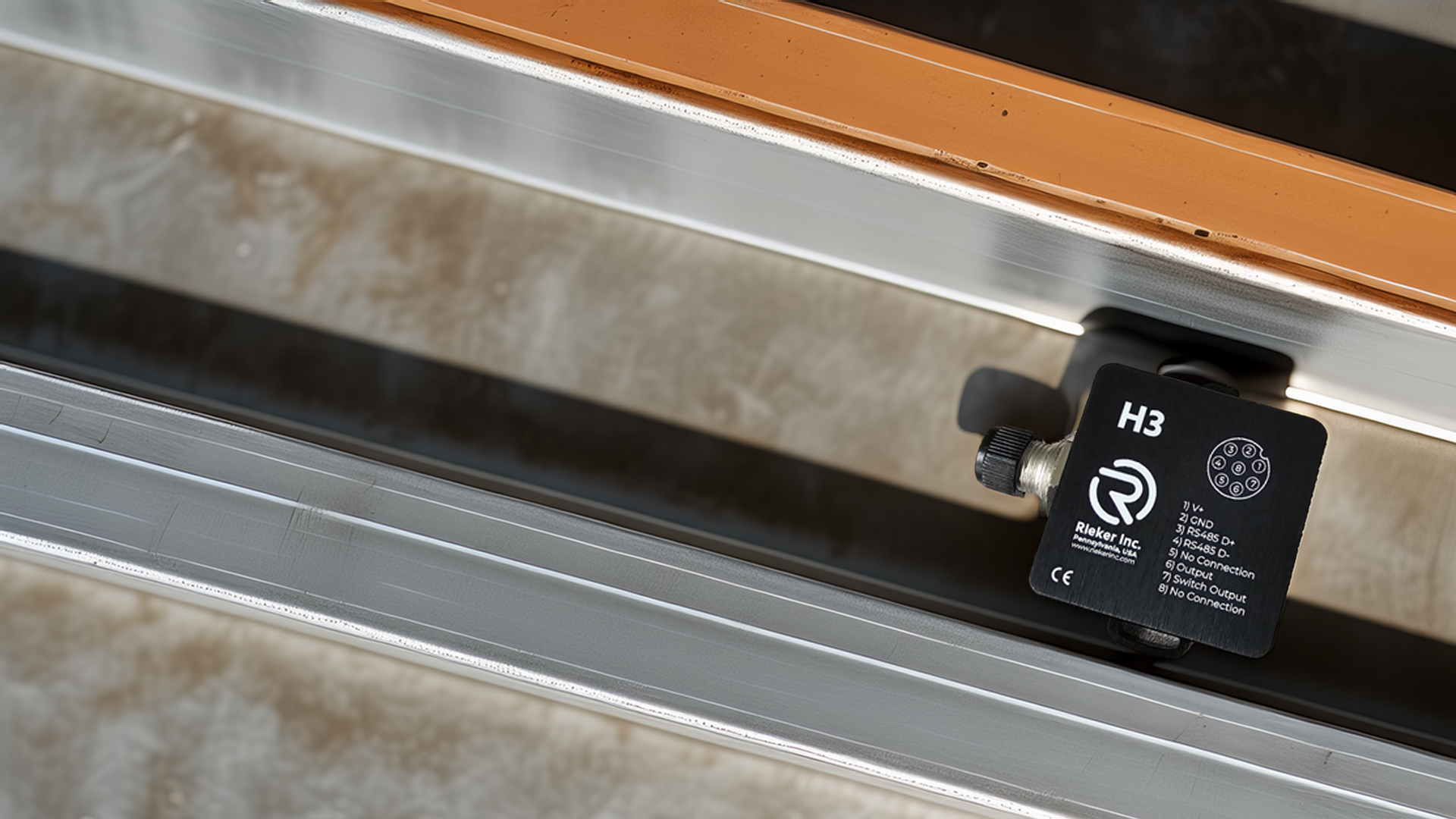 H3 Flex Series Inclinometer mounted on steel beam, showing vertical orientation and compact rugged housing